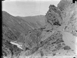 View of [Skippers Canyon Road?] with a horse drawn wagon above the [Shotover?] River, Queenstown District, Central Otago Region