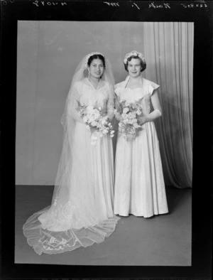 Unidentified bride and bridesmaid