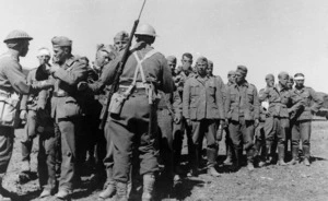 World War 2 New Zealand troops, searching German prisoners of war, in Greece