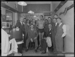 Wrestler, Mr Billy Meeske and Alley weighing in, and unidentified men, inside barber shop