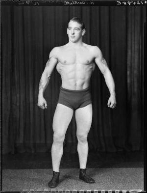 Wrestler, Mr H Bartlett, with tattoos