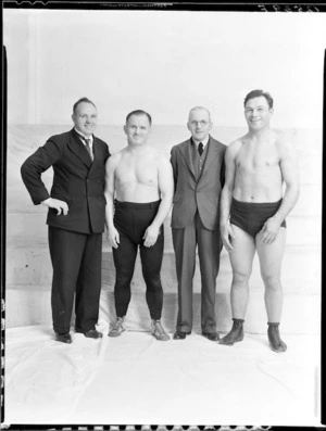 Wrestlers Walter Miller and Joey Woods, with Jack [Warnes?] and Mr Thompson