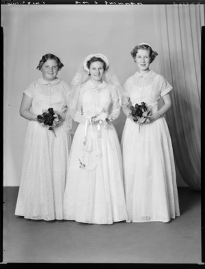 Unidentified bride and bridesmaids, probably Manning family wedding.