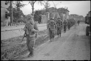 World War 2 New Zealand soldiers marching through Gambettola, Italy