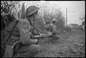 New Zealand infantry await the order to advance on Faenza, Italy, during World War 2