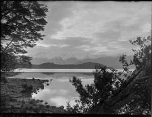 [Lake Manapouri] with snow covered mountains beyond, taken during Edgar Williams and Jack Murrell's climbing expedition, Fiordland National Park, South Island