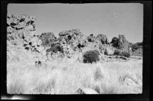 Landscape view of rock formations and valley floor, at Remarkable Dykes, Kaituna Pass, Canterbury