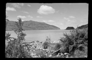 View from shore, looking towards bay and hills, Banks Peninsula, Canterbury