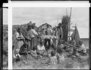 Unidentified Maori group making rope - Photographer unidentified