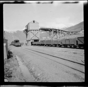Railway wagons at Avoca, snow covered mountains in the background