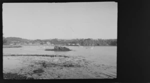 View of wharf and boats, including houses and hills in the background, Oban, Half Moon Bay, Stewart Island (Rakiura)