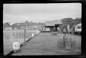 Wharf at Oban, Half Moon Bay, Stewart Island (Rakiura), including fish pots in the foreground and buildings in the distance