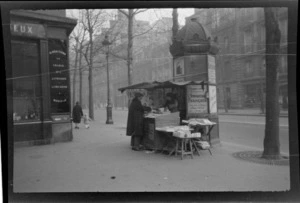 Street-side [newspaper?] kiosk , Paris, France