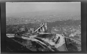 Elevated view of city, Marseille, France, including a building with drawbridge and fenced monument