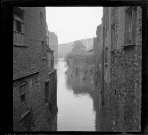 Canal flowing in between buildings, Castle Green, Bristol, England