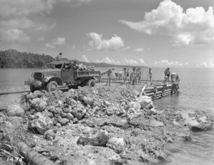 Military truck, and a jetty built by World War II New Zealand soldiers, Maravari, Vella Lavella Island, Solomon Islands