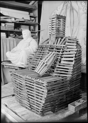 A wooden armature and marquette for a sculpture, in artist's studio