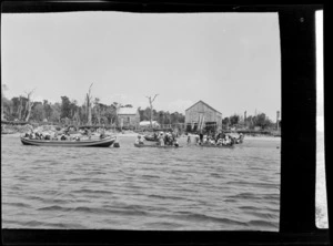 Groups of people in boats, probably Catlins district, Otago region
