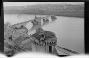 View of Pont d'Avignon and Rhone River from the ruins of the 'Palais des Papes' castle, with watch tower in foreground, Avignon, France