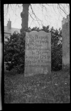 Headstone in graveyard, with the inscription 'Icy Repose le Corps de Mtre Jean Laffoley decede le 30 eme, Jeanvier 1759 Age de 100 ans Et quatre mois', Brittany, France