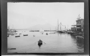 The Marina, showing tea rooms on wharf, small boats and yachts, including Mount Vesuvius in the distance, Naples, Italy