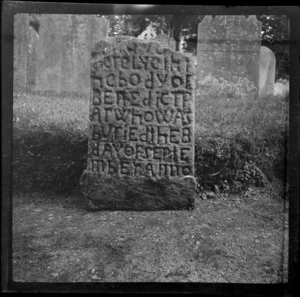 A gravestone inscribed with writing 'Here lyeth the body of Benedict, who was buried the 8th day of September', Devon, England