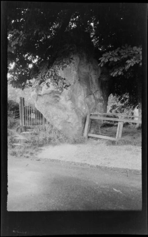Standing stone next to a gate and steps, Avebury, Wiltshire, England