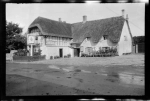 Thtached two-storied inn, housing luncheon and tea rooms, Avebury, Wiltshire, England