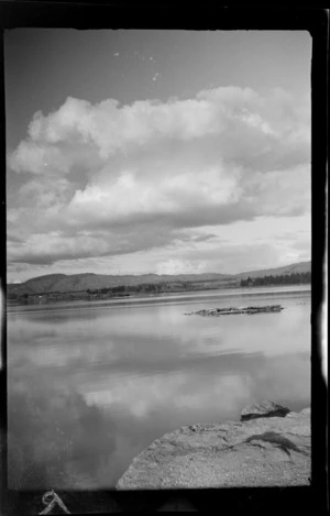 View across a lake [Rotorua, Bay of Plenty region?]