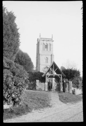 William and Lydia Williams outside a Norman style church, [Buckinghamshire], England