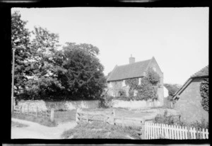 Vine covered, two storied cottage, in country lane, Buckinghamshire, United Kingdom