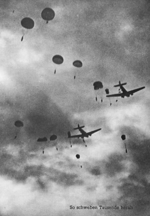 World War II paratroopers and aeroplanes in the sky above Crete