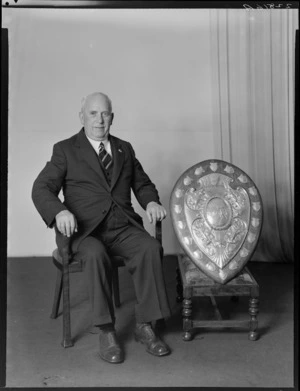 An unidentified man with the Ranfurly Shield