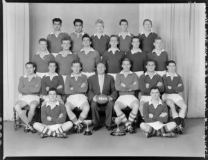 H M Customs rugby football team of 1959 with trophies