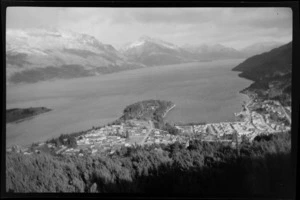 Aerial view of Queenstown, showing township, Lake Wakatipu, and The Remarkables