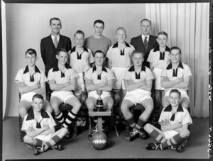 Wellington Association Football Club representatives, boys' soccer team of 1959, with trophy