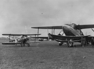 Photographer unknown: Two biplanes at New Plymouth airport
