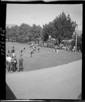 Elevated view of girls' running race finish, at a school sports day, Westport Technical High School, West Coast Region