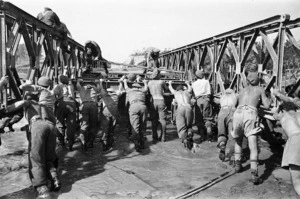 Kaye, George, b 1914 (Photographer) : New Zealand World War 2 Engineers constructing a bridge across the Reno River in Italy