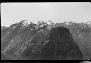 Shadow of a mountain peak cast onto range opposite, [West Coast Region]