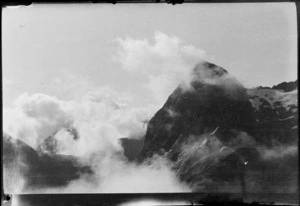 Mountain peaks, partly obscured by cloud, [Fiordland National Park or Canterbury Region?]