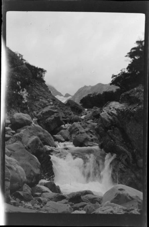 Mountain stream flowing over boulders, Crow Valley, Arthur's Pass National Park, Canterbury Region