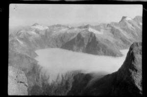 View from Mount Elliot, [MacKinnon Pass?], covered with fog, Southland