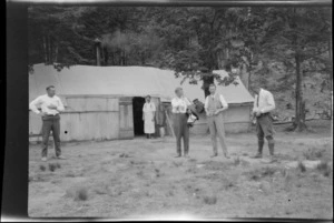 Five men [including Messrs Waldrop, Fisher, and Willis?], outside a dining tent at New Zealand Public Works Department camp, at the Harper Diversion, Selwyn District, Canterbury Region