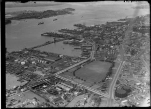 View of Auckland City and western waterfront area with Viaduct Harbour industrial area and Victoria Park to Devonport beyond, Auckland Harbour