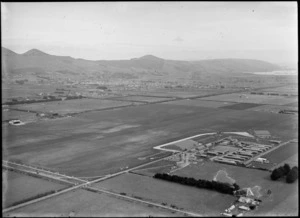 View of Taieri Aerodrome with hangars and buildings near Mosgiel, Dunedin, Otago