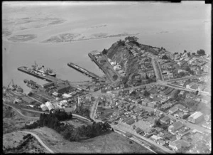 Port Chalmers Township with residential and commercial buildings, and wharf area with ships, Dunedin Harbour, Otago