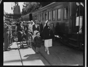 Polish refugee children boarding a train to Pahiatua, on wharves at Wellington