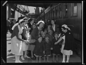 Polish refugee children being farewelled by nurses, before train journey to Pahiatua camps