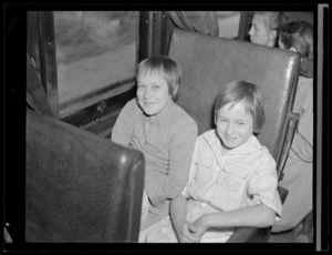 Two unidentified Polish girls on train travelling to children's refugee camp at Pahiatua